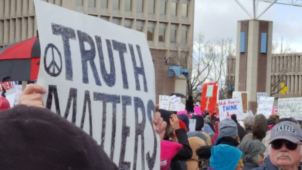 Poster saying "Truth Matters" at Women's March